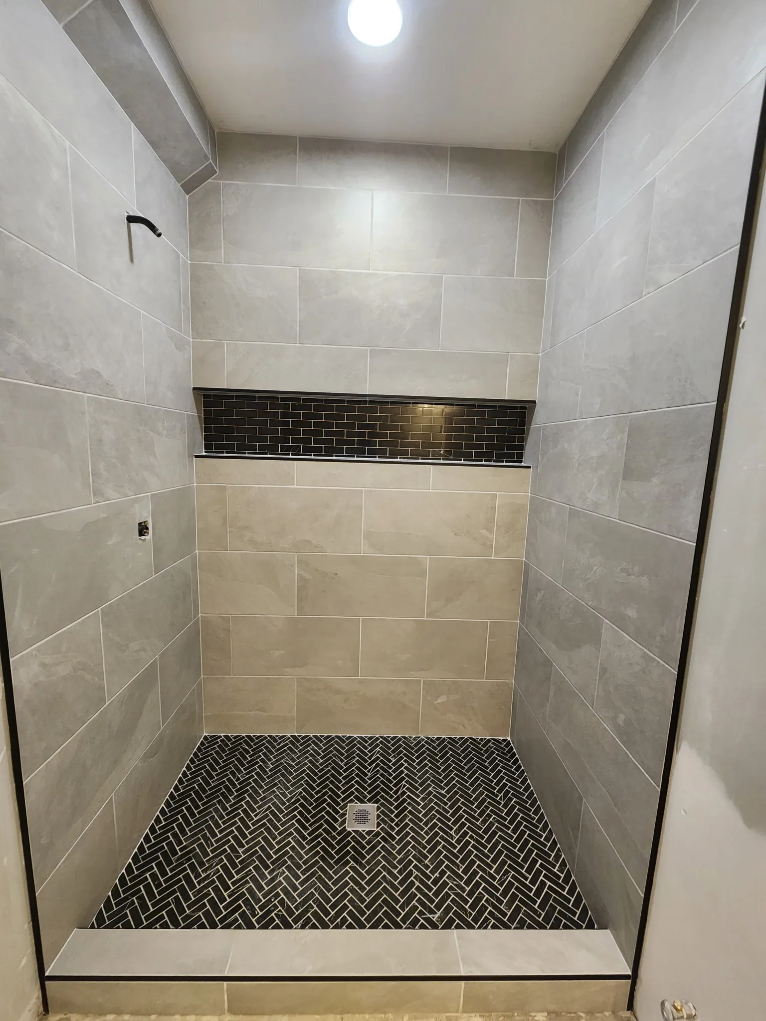 Modern bathroom remodel with walk-in shower and updated vanity in Omaha