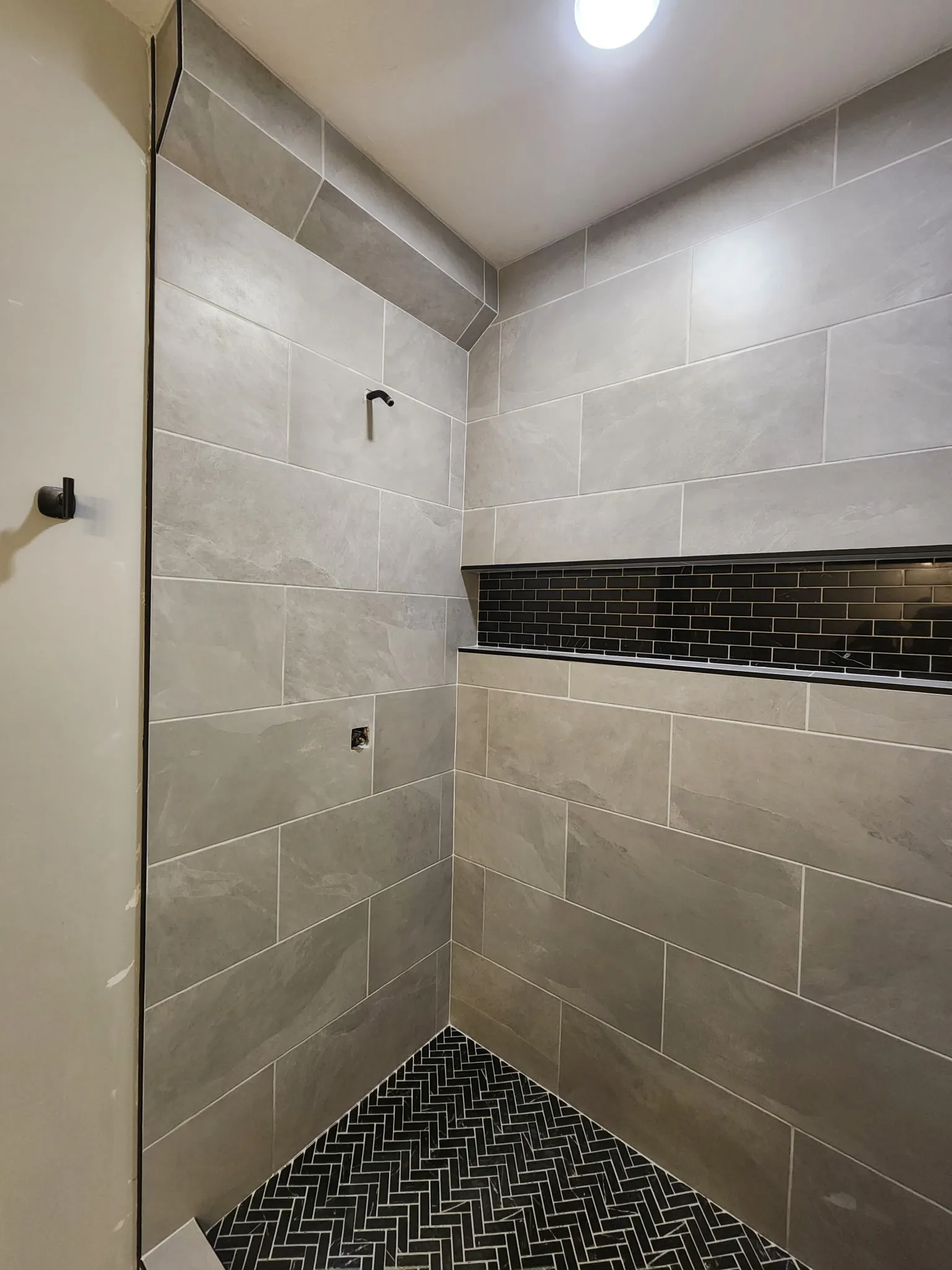 Complete bathroom remodel with new tile flooring and updated vanity